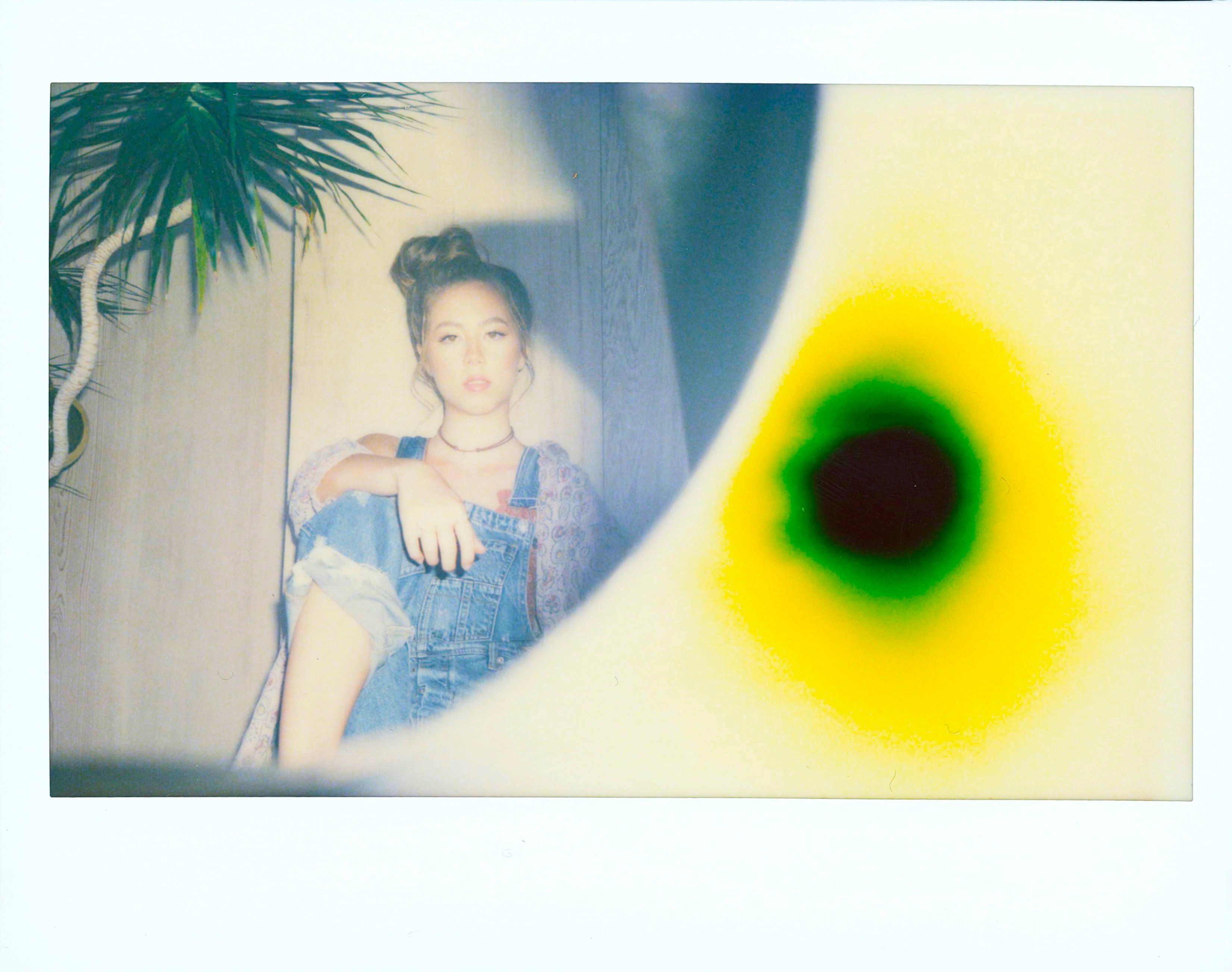 Hear Jenny Yim singing about “Angel On Earth” supported by Madison Yim