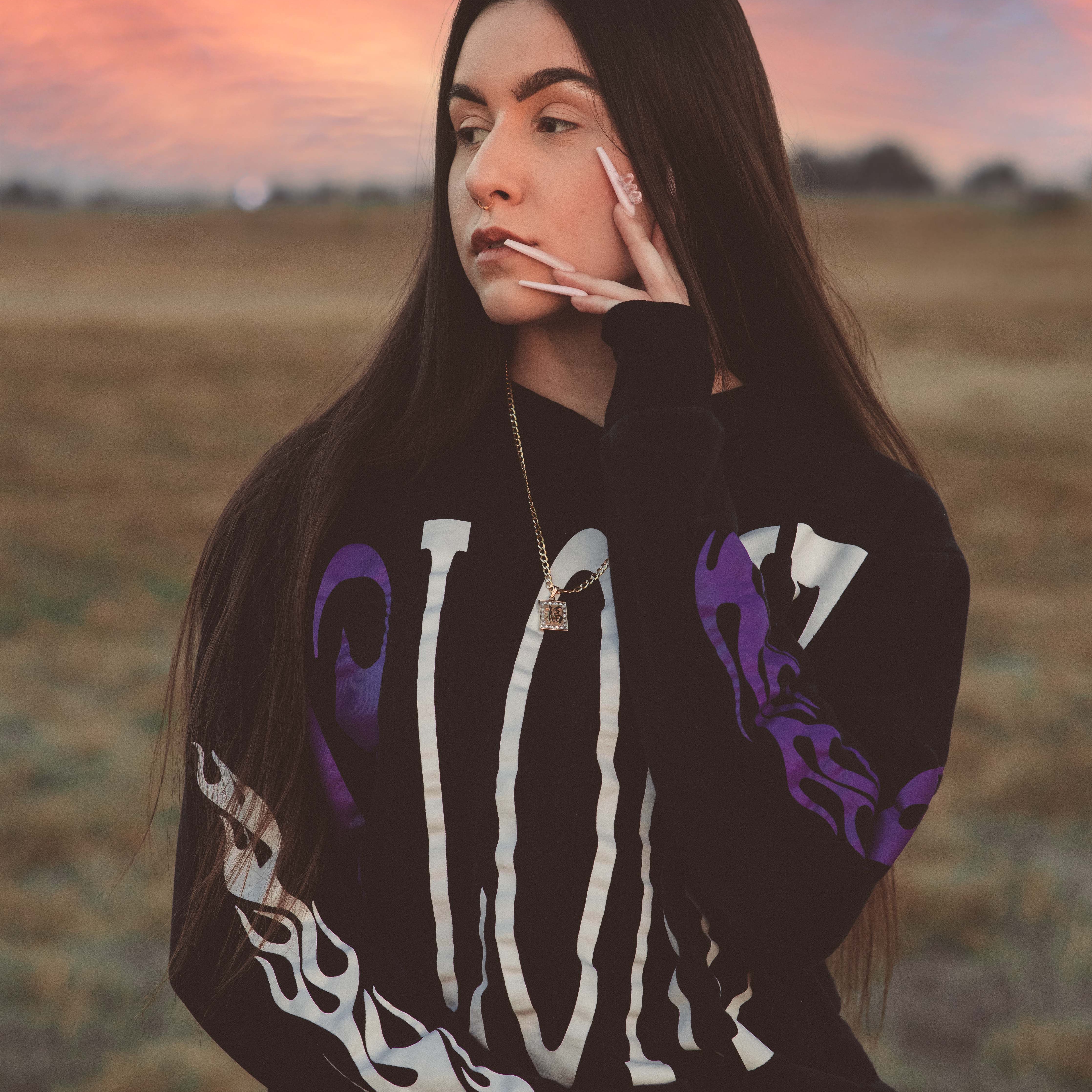 Listen to the song “LOE” by R&B singer Dyli