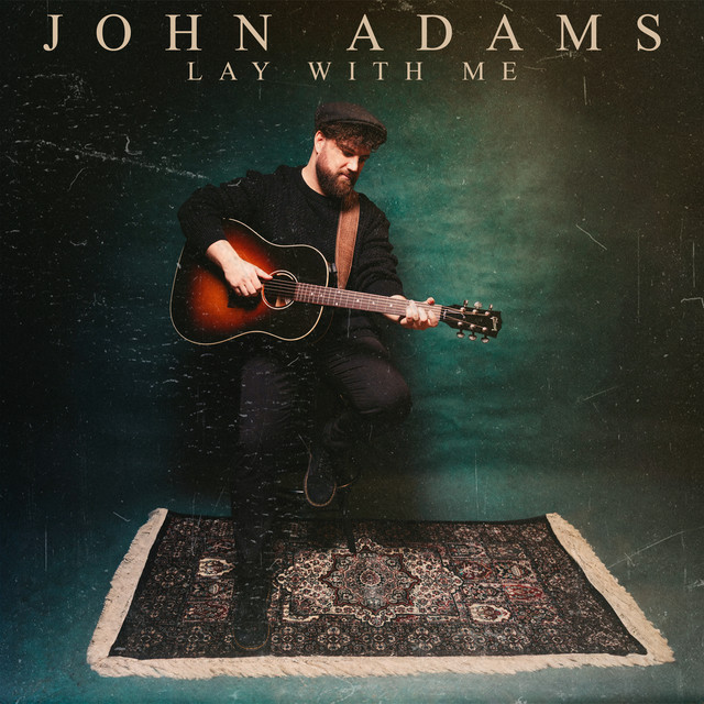 Listen to “Lay With Me” by singer John&nbsp;Adams