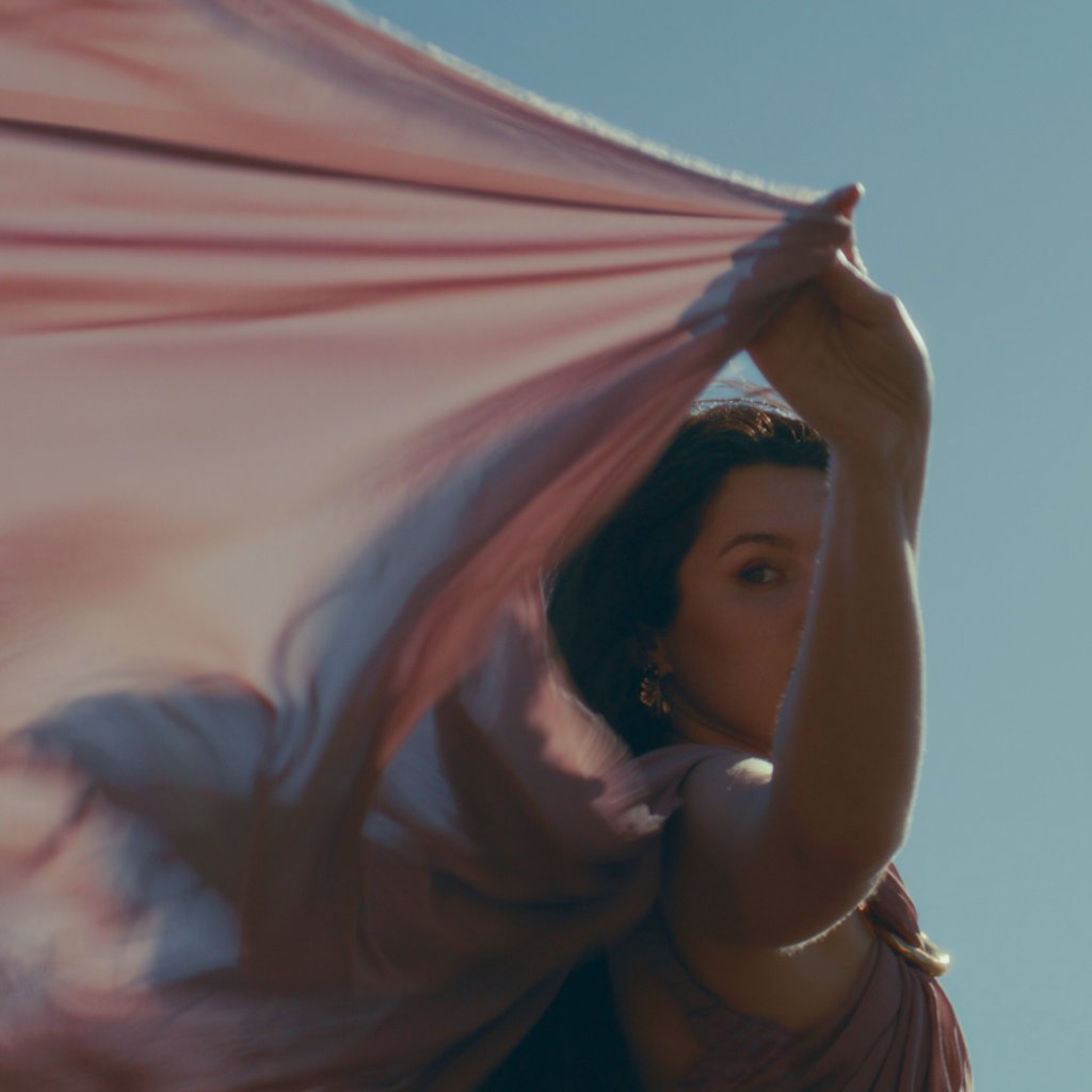 Alayna reveals bright visuals for her latest single “Softly”